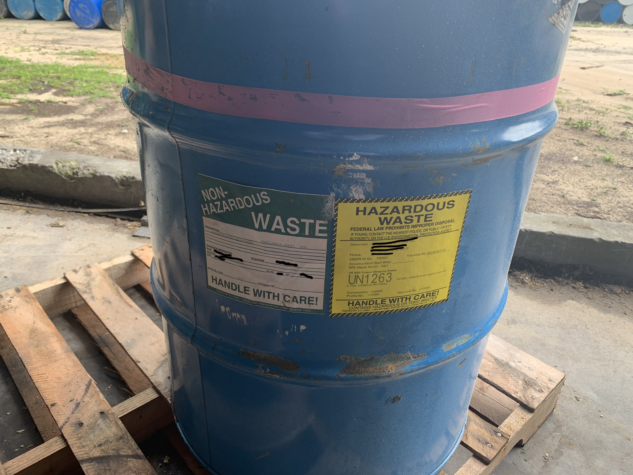 Hazardous waste disposal drum labeled